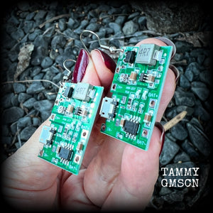 These awesome cyberpunk circuit board earrings measure just under 6 cms from tip to tip, and weigh only a few grams each, these are lovely and lightweight and not too dangly.

This pair has been made on stainless steel french hooks, to be worn in pierced ears.