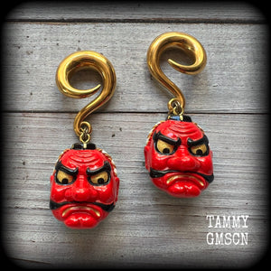 These unique earrings feature bright red painted resin tengu masks, measuring just on 7.5cms from tip to tip and weighing approx 25 grams each.
This pair has been made on 0 gauge (8mm) surgical steel full curl hooks, suitable for stretched lobes.