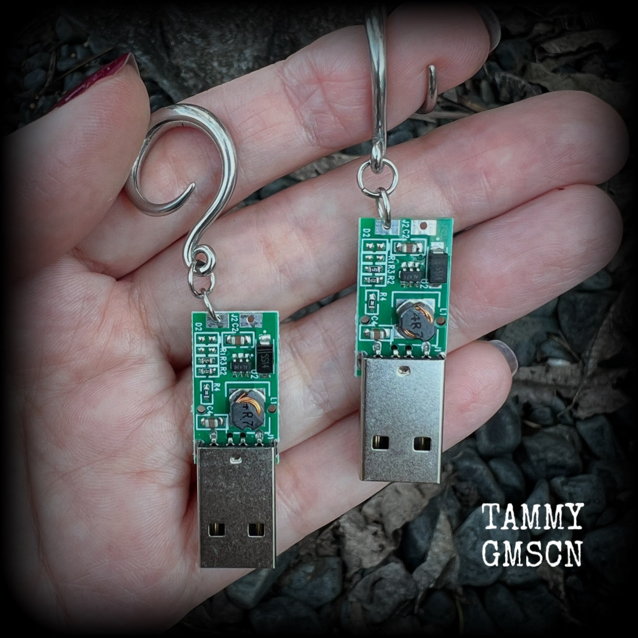 These awesome earrings feature a classic green USB, are nice and dangly, measuring approx 7cms from tip to tip, and nice and light weight, weighing only 6 grams each.

This pair has been made on 6 gauge (4mm) surgical steel full curl hooks, to be worn in stretched lobes.