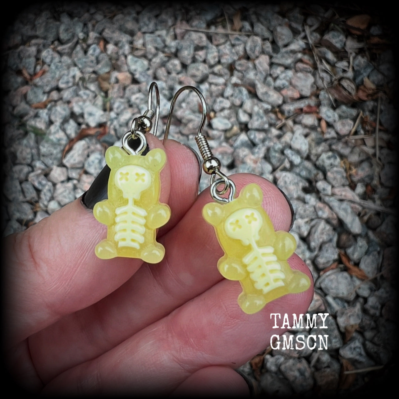 Featuring spooky cute yellow skeleton gummy bears, these adorable earrings measure just on 5cms from tip to tip and are super light weight, weighing only a gram or two each.

This pair has been made with stainless steel french hooks, to be worn in pierced ears.