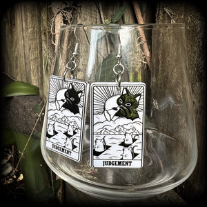 These adorable 'Judgement' tarot card earrings feature a lightweight tarot card charm, weighing only a few grams each, and measure approx 5cms from tip to tip.
This pair has been made with stainless steel french hooks, for pierced ears.