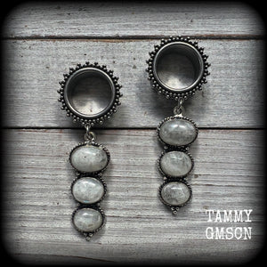 These earrings have been made with beautiful dangly polished rainbow moonstone gemstones, weighing approx 16 grams each and measuring approx 7.5 from tip to tip.
This pair has been made with 3/4” gauge (19mm) gauge ornate surgical steel screw fit tunnels, for stretched lobes.