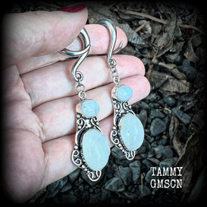 These gemstone earrings feature beautiful big rainbow moonstones in a beautiful antique silver setting.  These earrings are lovely and dangly measuring 8cms from tip to tip, and weighing 14 grams each. Made on 2 gauge (6mm) surgical steel full curls.