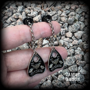 These beautiful antique silver and black enamel tunnel dangles are nice and lightweight and nice and dangly, weighing only 4 grams each, and measuring just over 6cms from tip to tip.

🕷️ PLEASE NOTE-This particular chain will not fit through tunnels smaller than 4 gauge (5mm), though I have lots of different chains that will. Get in touch and we can pick something just for you x

💥This listing includes one pair of surgical steel single flared O-ring earlets. 
