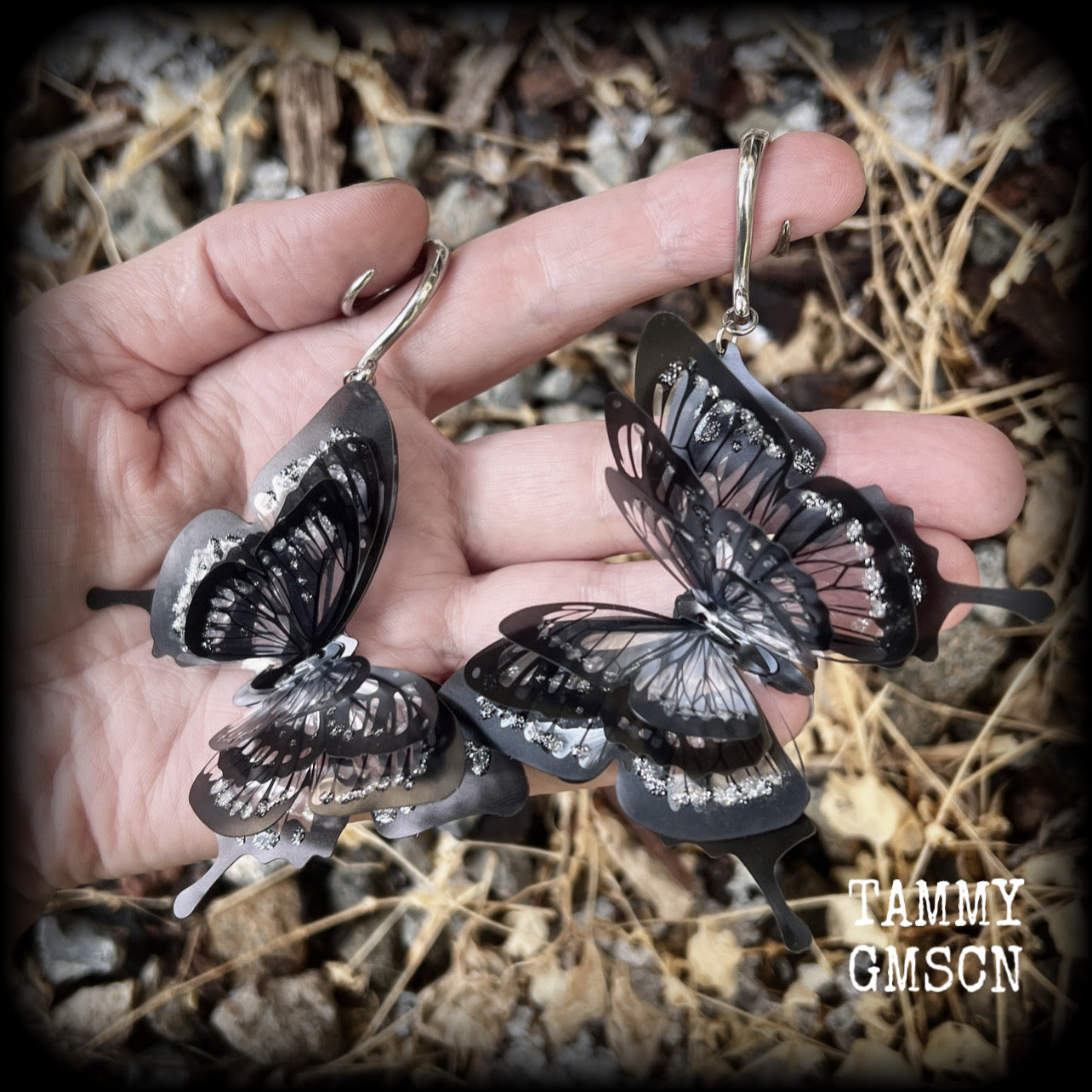These gorgeous gauged glittery earrings feature beautiful big swallowtail butterflies, super lightweight at just 5 grams a piece, measuring 11cms from tip to tip.

This pair have been made on 6 gauge (4mm) surgical steel full curls, to be worn through stretched lobes.