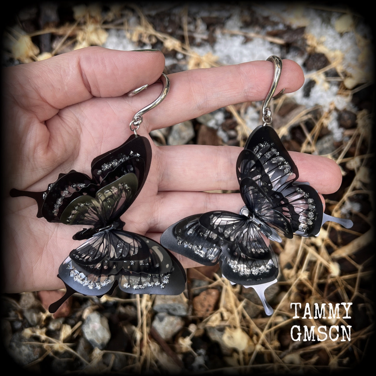 These gorgeous gauged glittery earrings feature beautiful big swallowtail butterflies, super lightweight at just 5 grams a piece, measuring 11cms from tip to tip.

This pair have been made on 6 gauge (4mm) surgical steel full curls, to be worn through stretched lobes.
