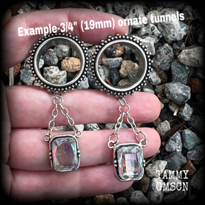 These gorgeous tunnel dangles feature beautiful dangly topaz gemstones set in antique silver, weighing approx 12 grams each and measuring just on 7cms from tip to tip.

This pair has been made with 3/4” gauge (19mm) surgical steel ornate tunnels-for stretched lobes.

