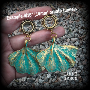 These beautiful boho tunnel earrings feature gorgeous patina ginkgo leaves, weighing approx 16 grams each and measuring  just under 7.5cms from tip to tip.

This pair has been made with 9/16” gauge (14mm) ornate surgical steel screw fit tunnels.