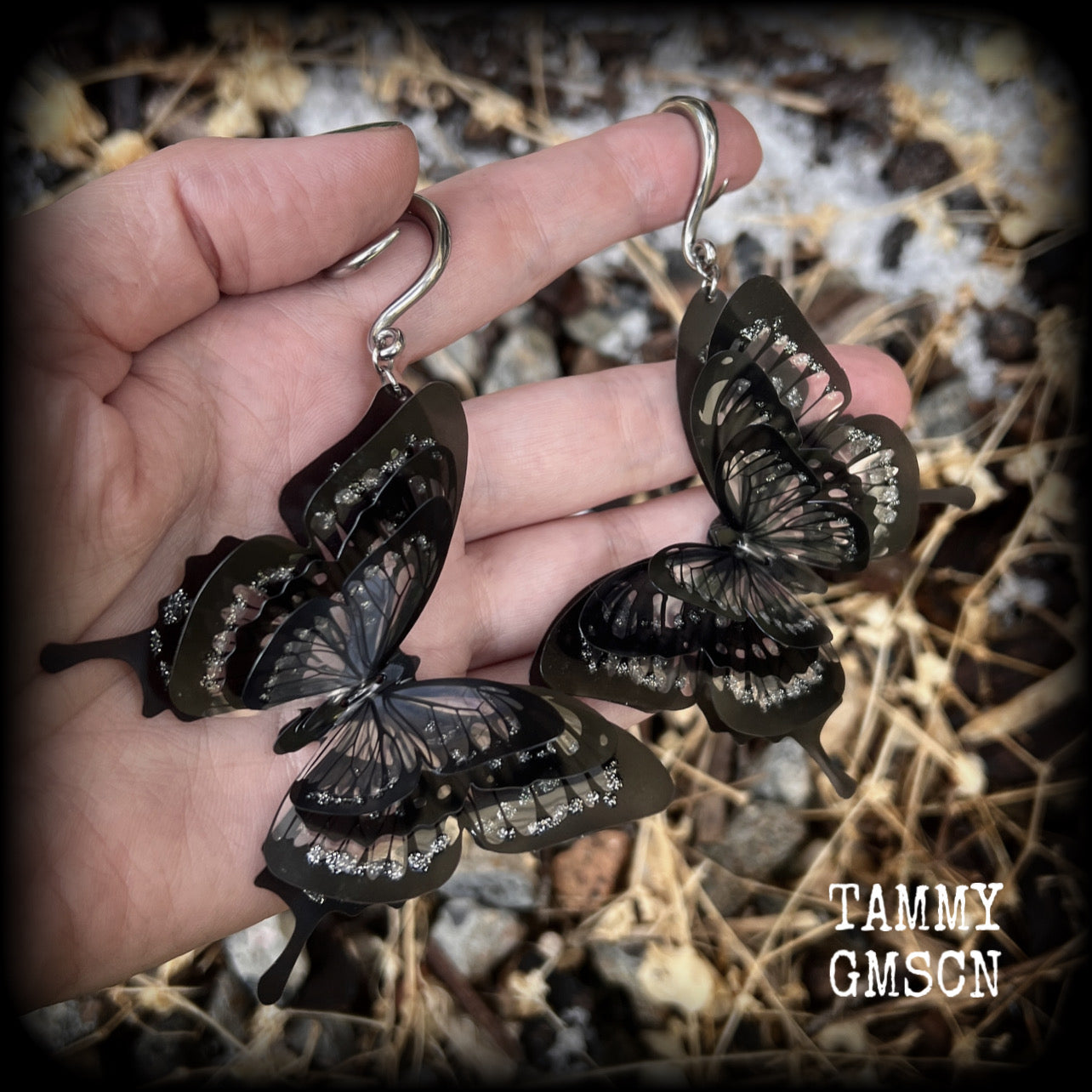 These gorgeous gauged glittery earrings feature beautiful big swallowtail butterflies, super lightweight at just 5 grams a piece, measuring 11cms from tip to tip.

This pair have been made on 6 gauge (4mm) surgical steel full curls, to be worn through stretched lobes.