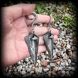 These awesome Star Wars Imperial Star Destroyer gauged earrings are nice and big, measuring just under 10cms from tip to tip, and not too heavy at 28 grams a piece.


This pair has been made on 2 gauge (6mm) surgical steel full curl hooks, to be worn in stretched lobes.