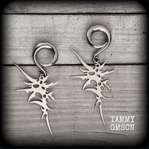 These awesome punk rock earrings feature stainless steel cybersigils, weighing approx 9 grams a piece, and nice and dangly on 8cms from tip to tip.

This pair has been made on 2 gauge (6mm) surgical steel full curl hooks, suitable for stretched lobes.
