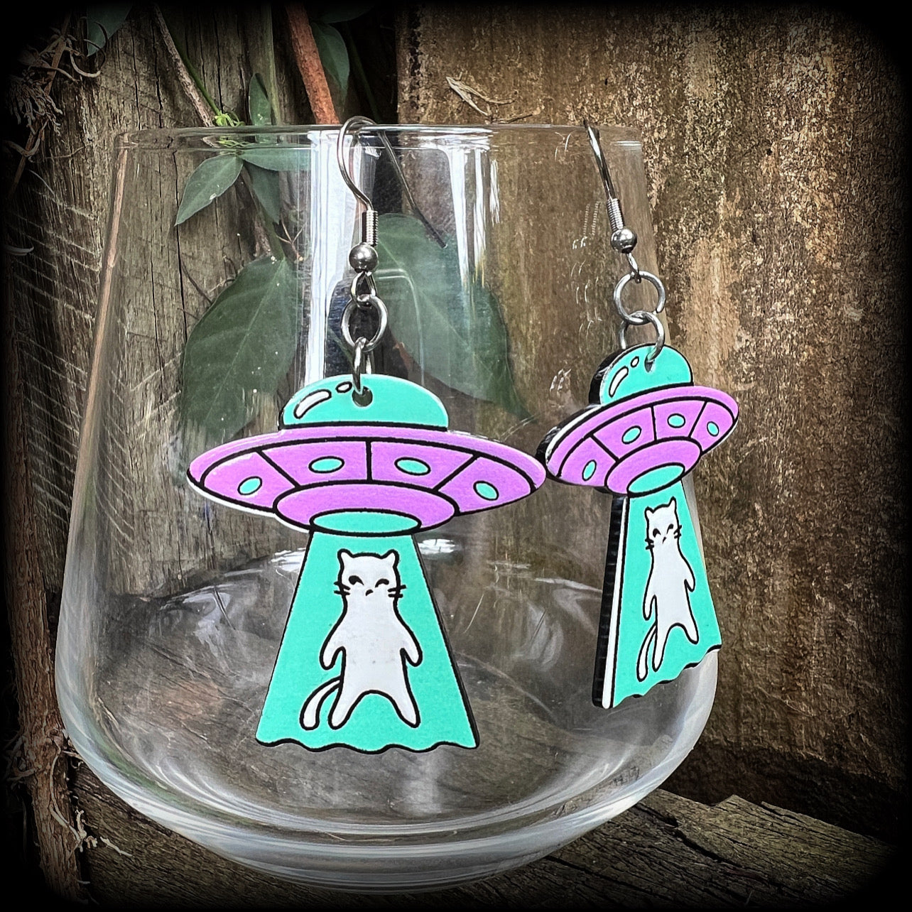 These adorable pastel purple 'UFO cat abduction' earrings measure just over 6cms from tip to tip, and weigh only a few grams each.
This pair has been made on stainless steel french hooks, suitable for pierced ears.