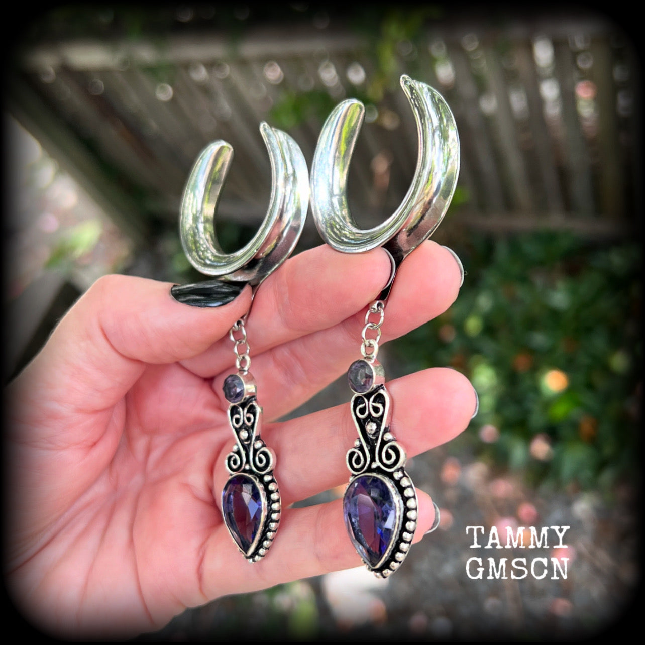 These gorgeous gauged earrings feature beautiful purple facet amethyst gemstones in an antique silver boho setting, measuring just over 9.5 from tip to tip, and weighing approx 17 grams a piece.

This pair have been made on 1.18” gauge (30mm) surgical steel cradles-suitable for stretched lobes.