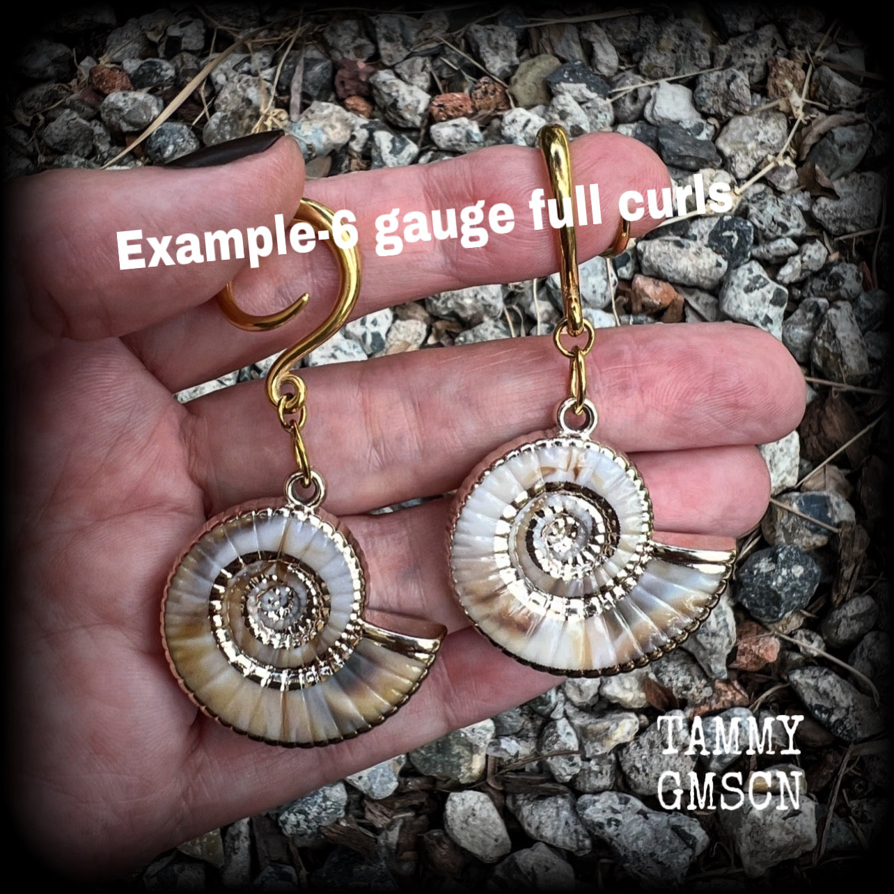 These gauged earrings feature gorgeous acrylic nautilus sea shells, super lightweight- weighing 9 grams each, and nice and dangly, measuring just under 7cms from tip to tip.
These beautiful earrings have been made on 6 gauge (4mm) surgical steel full curl hooks, to be worn in stretched lobes.