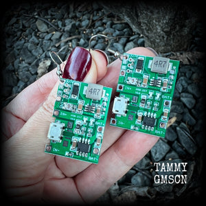These awesome cyberpunk circuit board earrings measure just under 6 cms from tip to tip, and weigh only a few grams each, these are lovely and lightweight and not too dangly.

This pair has been made on stainless steel french hooks, to be worn in pierced ears.