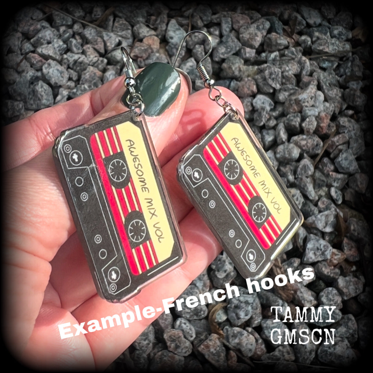 This awesome pair of earrings features a pair of classic 80’s mix tapes, are nice and lightweight weighing only a few grams each, and measure approx 7cms from tip to tip.

This pair has been made on stainless steel french hooks, suitable for pierced ears.
