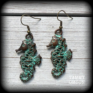 This pair of earrings features a gorgeous antique verdigris patina seahorse, measuring just under 6cms from tip to tip, and weighing 7 grams each.

This pair has been made with french hooks, for pierced ears.