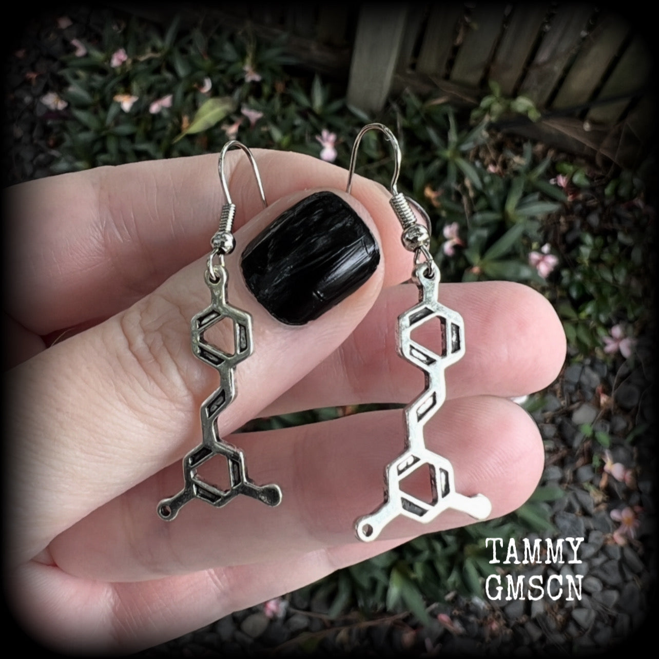 These awesome earrings feature red wine molecules, measuring just under 5cms from tip to tip, and are nice and lightweight, weighing only a few grams each.

This pair have been made with stainless steel french hooks, suitable for pierced ears.