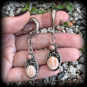 This pair of beautiful rhodochrosite gauged earrings features one smaller gemstone sitting atop a larger oval polished gemstone in a gorgeous boho antique silver setting. choose your own hooks from 6mm up to 30mm.