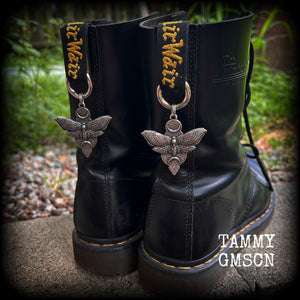 These stunning boot charms are one of the larger and heavier pairs we offer, featuring gorgeous pewter moth and crescent moon charms, nice and big-these measure approx 5 across and just on 8cms from top to bottom.

Made to last, all our boot charms are made with super sturdy snap rings and strong jump rings.