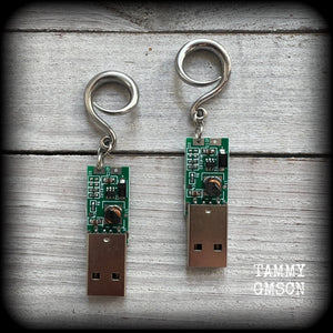 These awesome earrings feature a classic green USB, are nice and dangly, measuring approx 7cms from tip to tip, and nice and light weight, weighing only 6 grams each.

This pair has been made on 6 gauge (4mm) surgical steel full curl hooks, to be worn in stretched lobes.