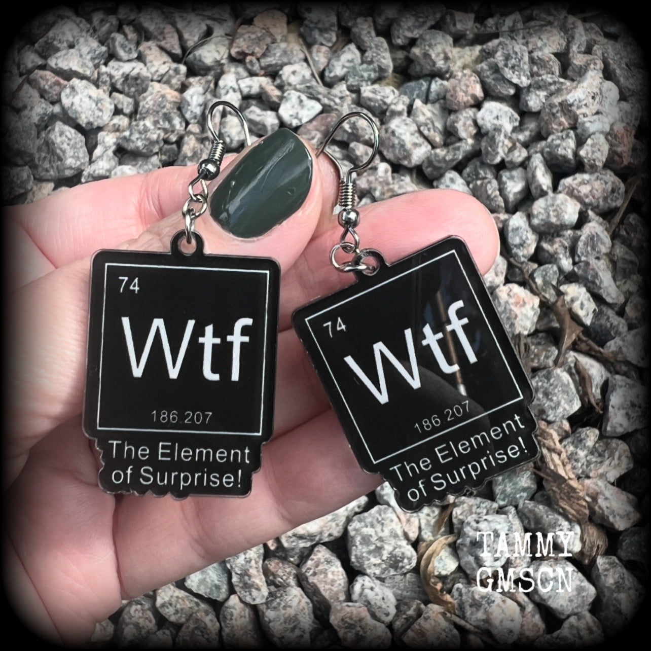 This cheeky pair of earrings features acrylic letter tiles showing the chemical element of Wtf, the Element of Surprise!!!
Measuring just over 6cms from tip to tip, these earrings weigh only a few grams each.

This pair has been made with stainless steel french hooks, suitable for pierced ears.
