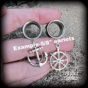 Featuring gorgeous antique silver anchor and ships wheel charms, these adorable earrings are lightweight, weighing only 6 grams each and measure just on 5cms from tip to tip.

This pair have been made with 5/8" gauge (16mm) surgical steel screw fit earlets-for stretched lobes.