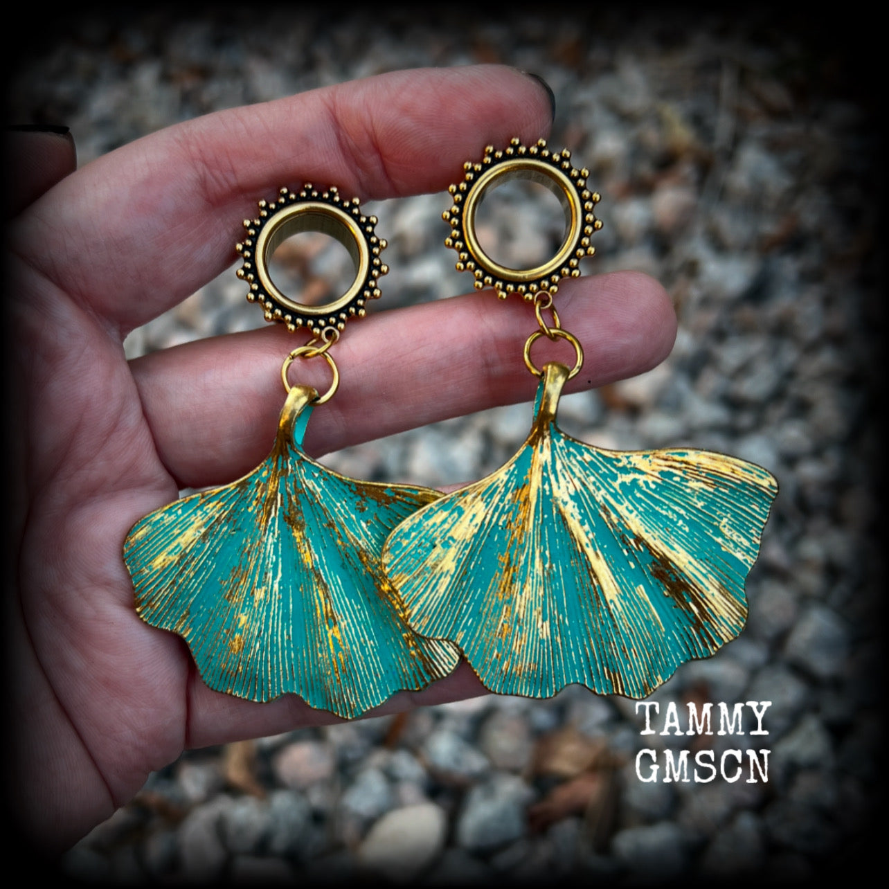 These beautiful boho tunnel earrings feature gorgeous patina ginkgo leaves, weighing approx 16 grams each and measuring  just under 7.5cms from tip to tip.

This pair has been made with 9/16” gauge (14mm) ornate surgical steel screw fit tunnels.