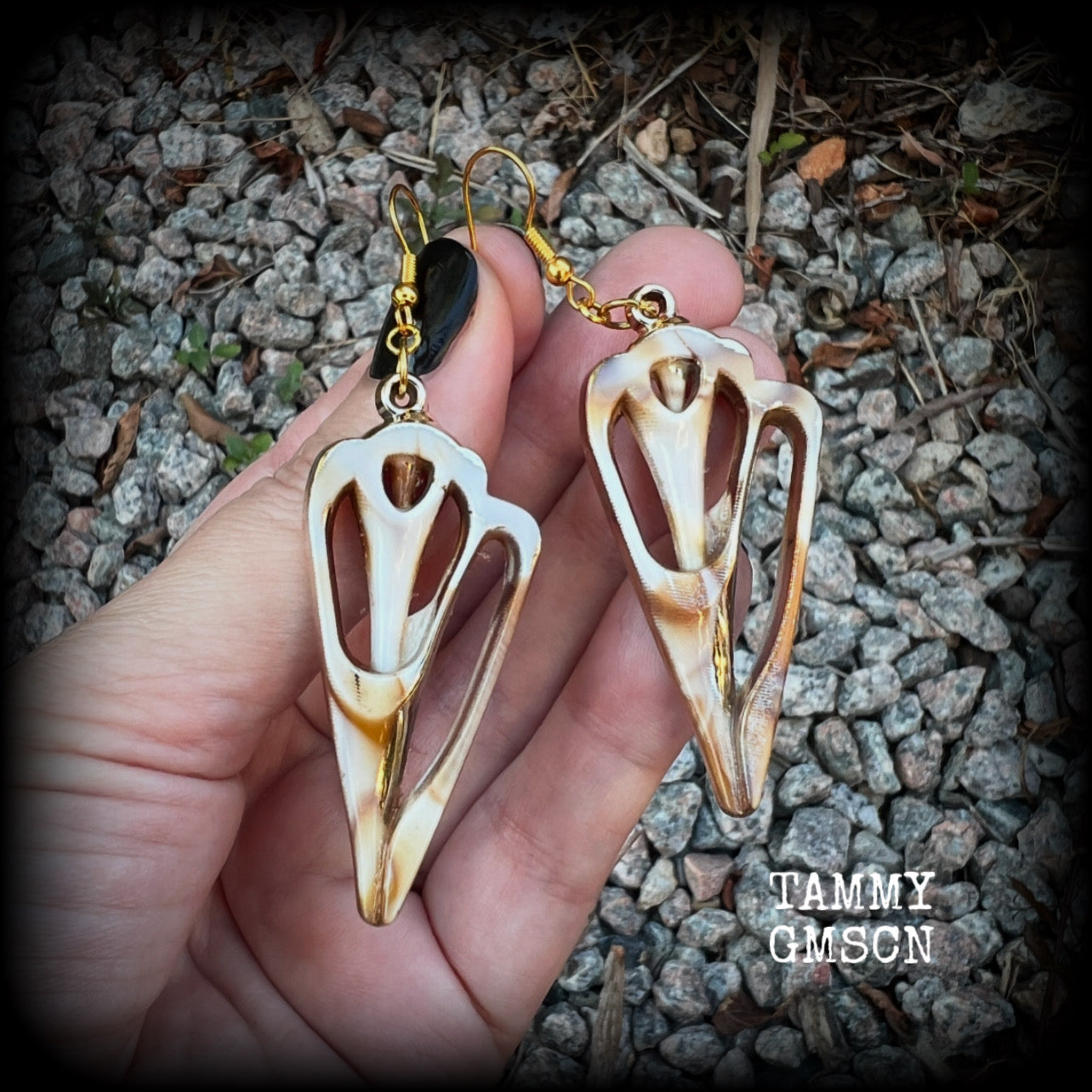 These earrings feature gorgeous acrylic conch sea shell slices , super lightweight- weighing only a few grams each, and nice and dangly, measuring just on 7cms from tip to tip. 

These beautiful earrings have been made with antique gold french hooks-for pierced ears.