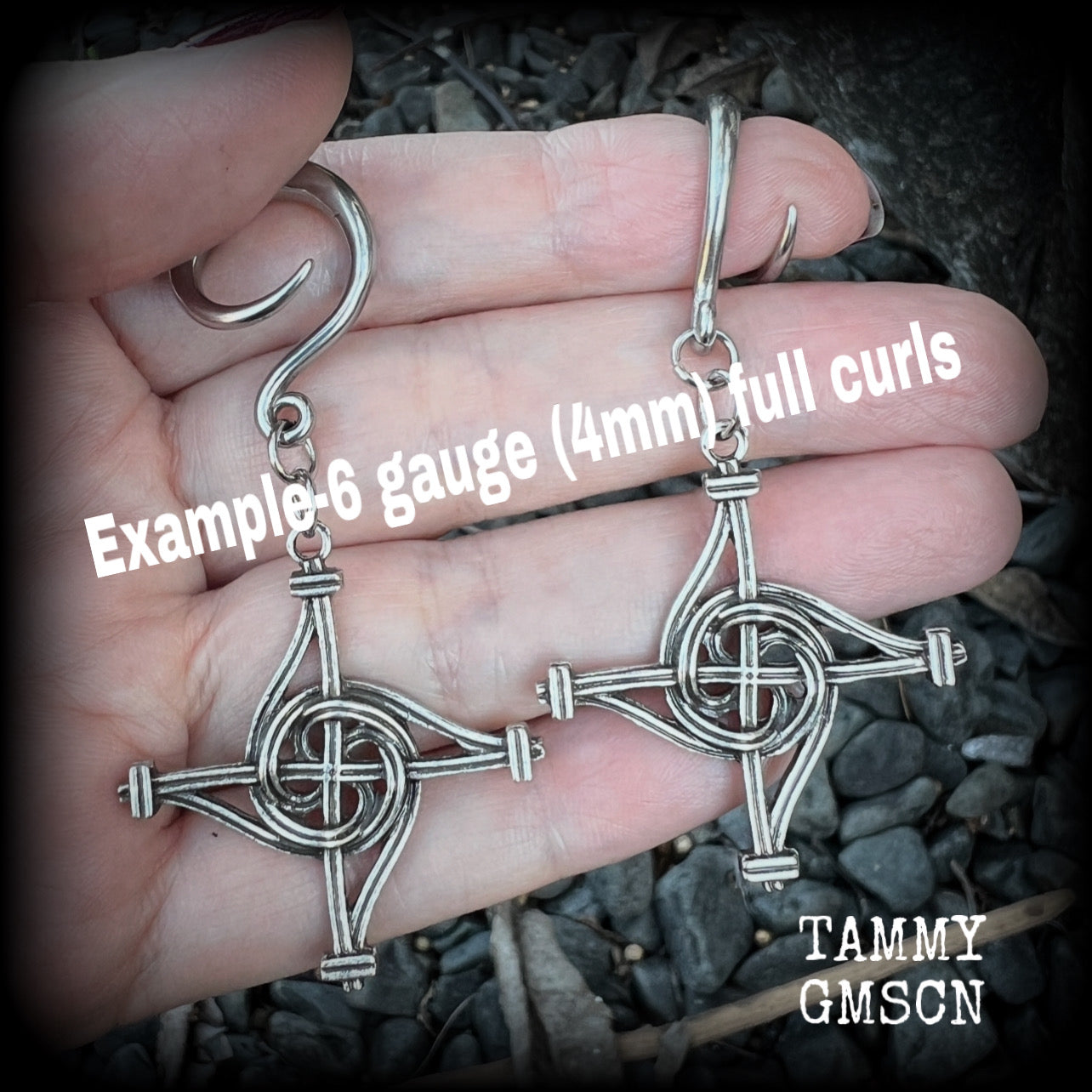 These gorgeous gauged earrings feature antique silver interwoven Brigids crosses, measuring approx 7.5cms from tip to tip, and weighing approx 7 grams each.

This pair has been made on 6 gauge (4mm) surgical steel full curl hooks, suitable for stretched lobes.