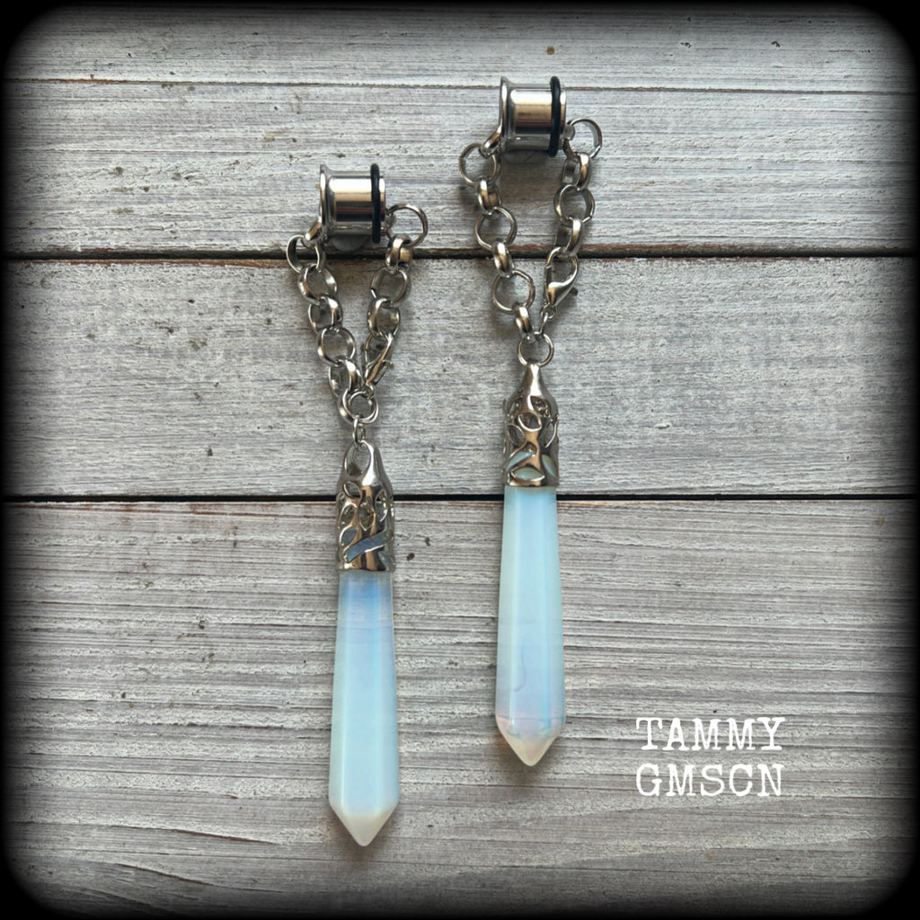 These gorgeous opalite earrings have been made with transluscent gemstone points, are nice and dangly measuring in at approx 10.5cms from tip to tip and not too heavy at 15 grams a piece. 
