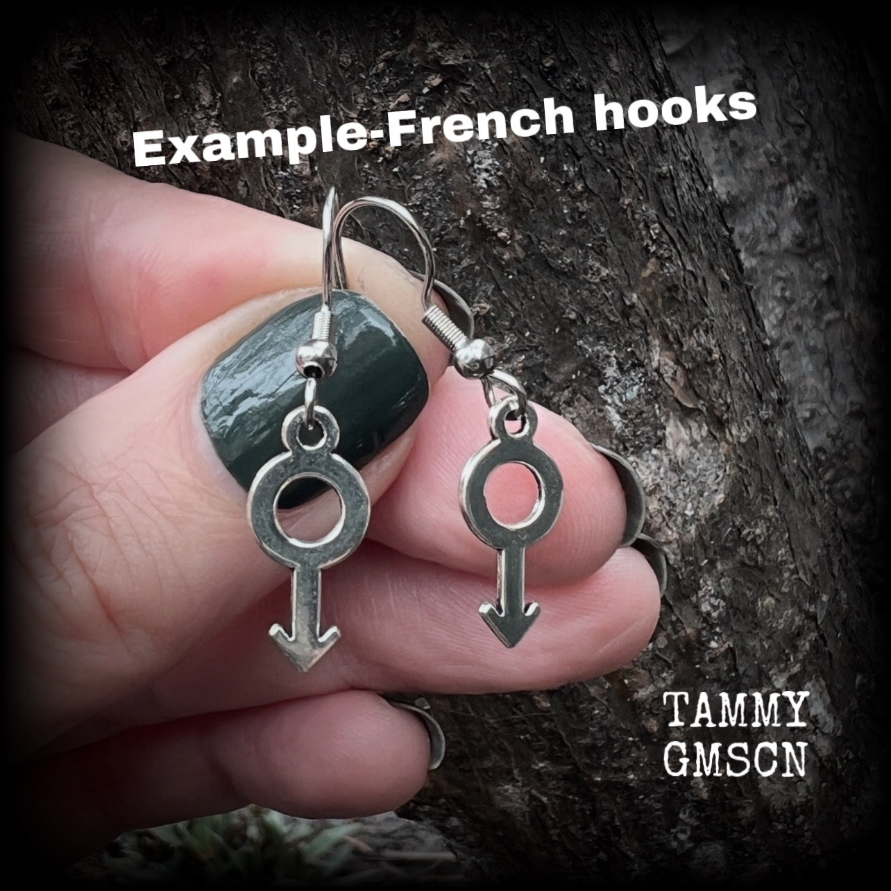 This pair of earrings features antique silver Male/Mars symbols, are nice and lightweight (at a gram or two each), measuring approx 3.5cms from tip to tip.

This pair has been made on stainless steel french hooks, for pierced ears.