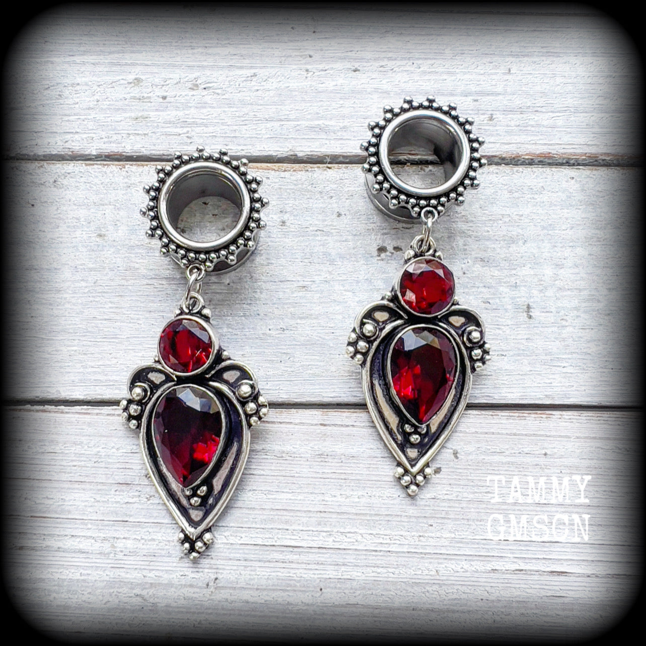 Beautiful deep red garnet gemstones in a gorgeous boho antique silver setting, made on ornate tunnel earrings for stretched lobes, available on a range of hooks and clasps for pierced ears and stretched lobes.