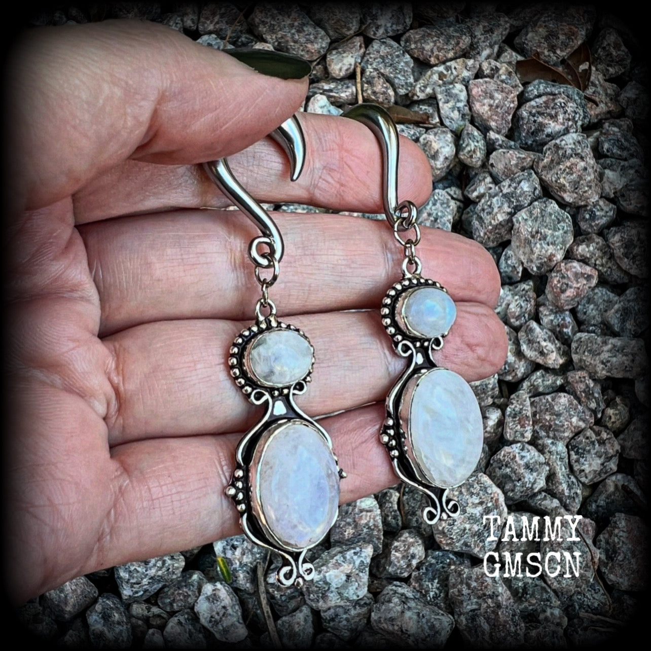These gauged earrings have been made with gorgeous big polished Rainbow moonstone gemstones in a beautiful boho antique silver setting, measuring approx 8cms from tip to tip, and weighing approx 12 grams each, not too heavy.

These earrings have been made on 2 gauge (6mm) surgical steel half curl hooks, to be worn in stretched lobes.