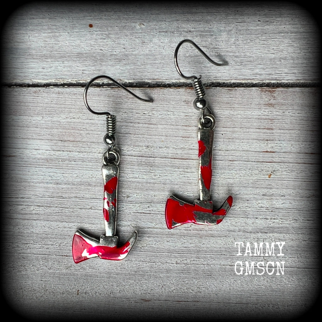 These awesome little 'Lizzie Borden' earrings 
feature an antique silver pickaxe and adorned with b l o o d spatter, measuring approx 5 cms from tip to tip and weighing only a gram or two each.

This pair has been made with stainless steel french hooks, for pierced ears.