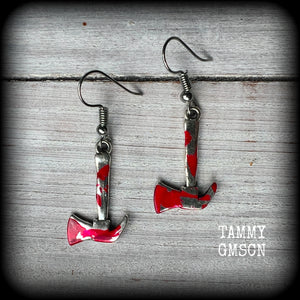 These awesome little 'Lizzie Borden' earrings 
feature an antique silver pickaxe and adorned with b l o o d spatter, measuring approx 5 cms from tip to tip and weighing only a gram or two each.

This pair has been made with stainless steel french hooks, for pierced ears.