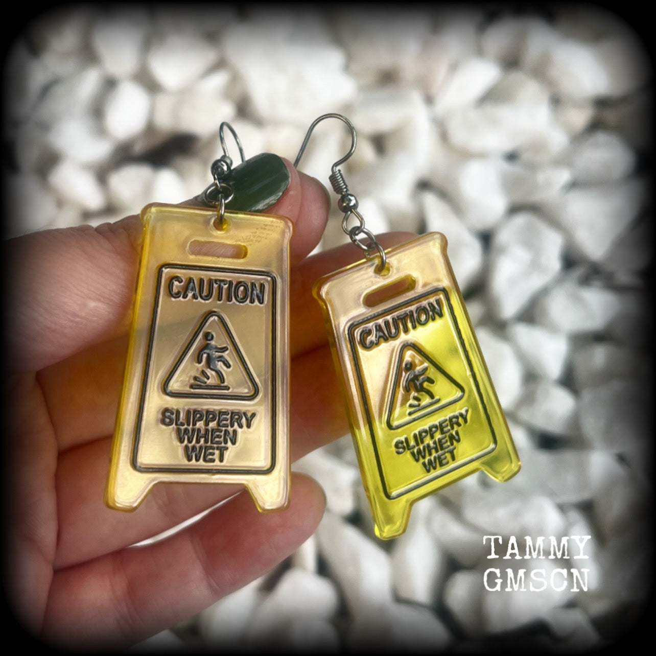These awesome fluoro yellow acrylic ‘Slippery when wet’ sign earrings measure in at just on 7cms, are nice and light weighing only 4 grams each.

This pair has been made with stainless steel french hooks, for pierced ears.