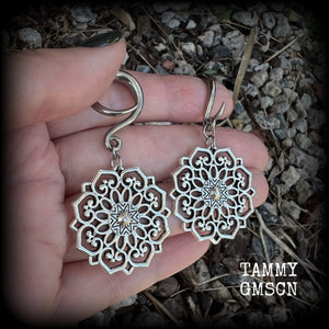 These beautiful antique silver mandala gauged earrings are nice and light weight, weighing approx 6 grams a piece, measuring approx 6cms from tip to tip.

This pair have been made on 6 gauge (4mm) surgical steel full curl hooks, suitable for stretched lobes.