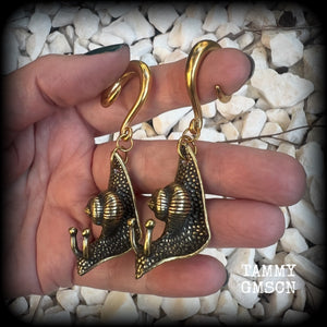 These awesome brass snail ear hangers feature gorgeous brass garden snails, measuring just on 7.5cms from tip to tip, and weighing approx 30 grams each.

This pair has been made on 2 gauge (6mm) surgical steel full curls, suitable for stretched lobes.