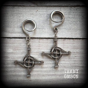 These gorgeous gauged earrings feature antique silver interwoven Brigids crosses, measuring approx 7.5cms from tip to tip, and weighing approx 7 grams each.

This pair has been made on 6 gauge (4mm) surgical steel full curl hooks, suitable for stretched lobes.
