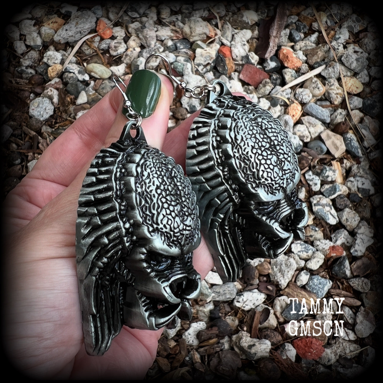 This is a pair of awesome Predator earrings! These are nice and big measuring approx 9.5cms from tip to tip, and weigh 33 grams each (these are HEAVY).

This pair have been made on stainless steel french hooks-for stretched lobes.

