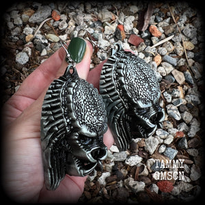 This is a pair of awesome Predator earrings! These are nice and big measuring approx 9.5cms from tip to tip, and weigh 33 grams each (these are HEAVY).

This pair have been made on stainless steel french hooks-for stretched lobes.

