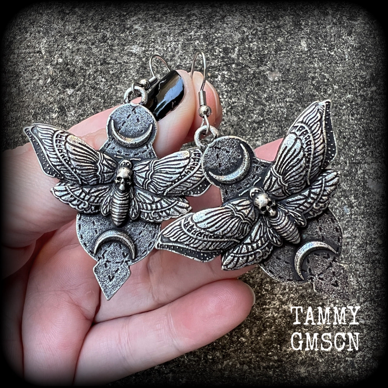 These gorgeous pewter earrings feature a large deaths head moth sitting between two crescent moons, nice and dangly, measuring just under 7cms, and weighing approx 20 grams each.