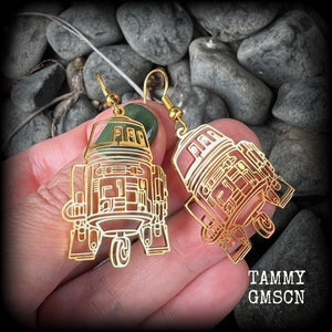 Featuring awesome stainless steel R2D2 charms, these earrings measure just over 5cms from tip to tip, and are super lightweight, weighing only a gram or two.
This pair has been made with french hooks, suitable for pierced ears.