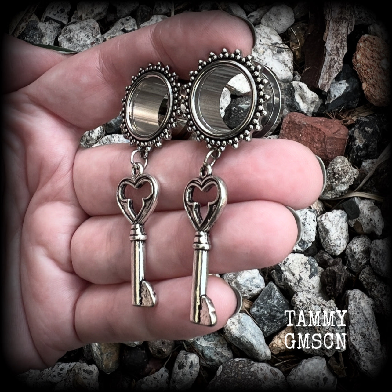 These gothic cathedral inspired tunnel earrings feature gorgeous antique silver keys, weighing approx 9 grams each, and measuring just under 6cms from tip to tip.

This pair have been made on 5/8” gauge (16mm) ornate surgical steel tunnels, suitable for stretched lobes.