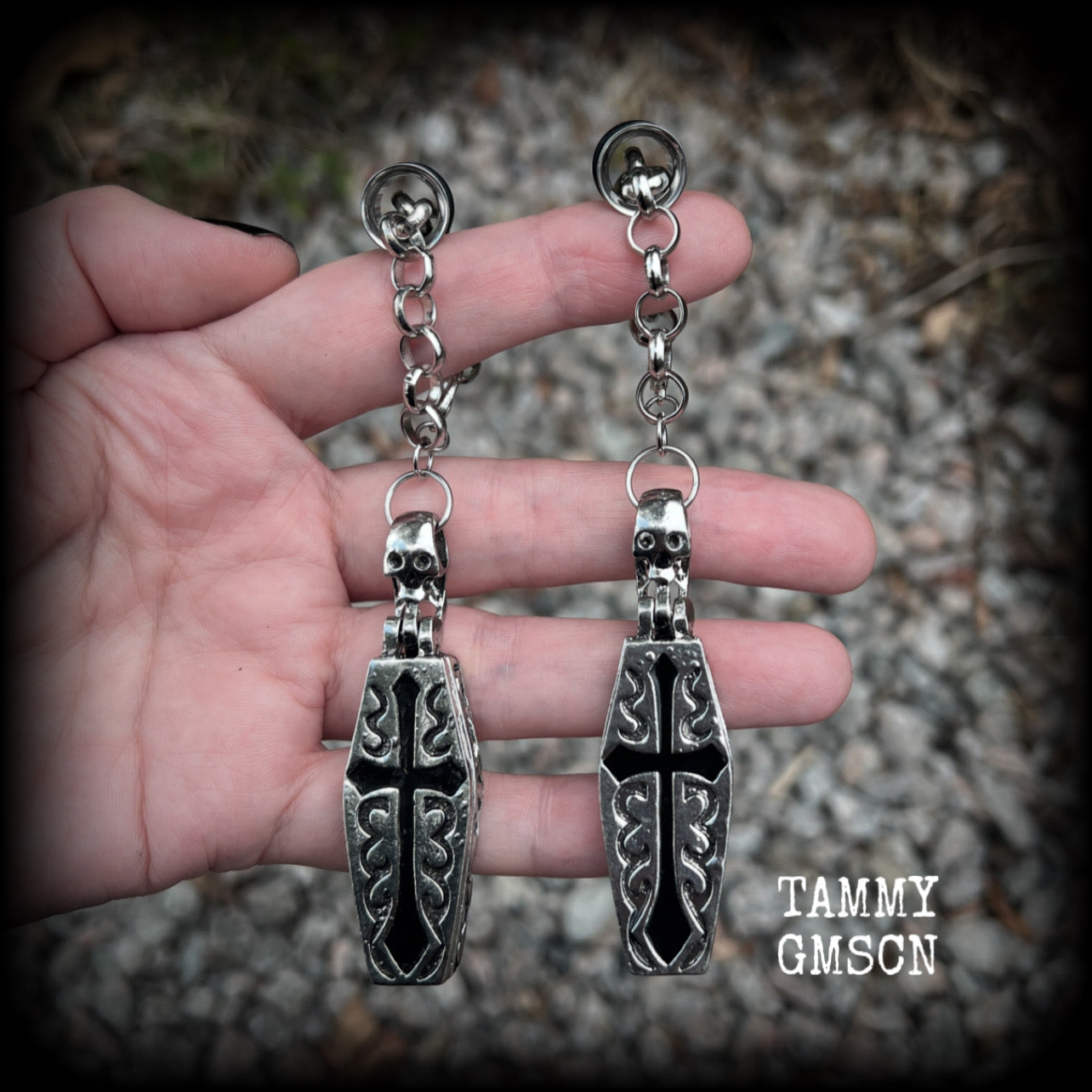 These beautiful antique silver and black enamel coffin tunnel dangles are nice and dangly, weighing approx 25 grams each, and measuring just over 11cms from tip to tip.

⚰️ This listing is for a chunky chain/lobster clasp combination suitable for 00 gauge and larger. 
If you choose a smaller size of tunnel than 00 gauge we will make these on a smaller chain.