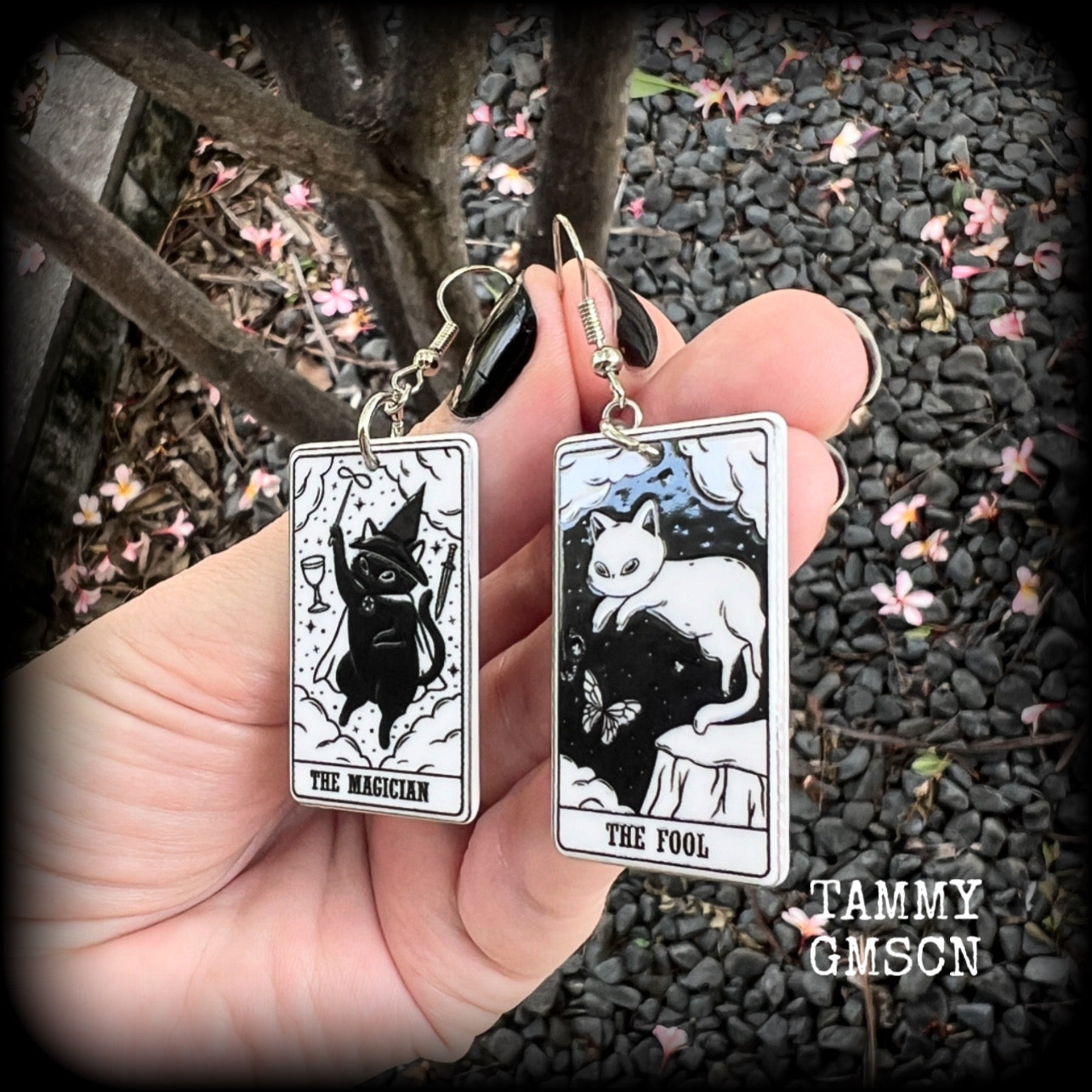 These adorable cat tarot earrings feature The Fool and The Magician lightweight tarot card charms, weighing only a few grams each, and measure approx 5cms from tip to tip.

This pair has been made with stainless steel french hooks, for pierced ears.
