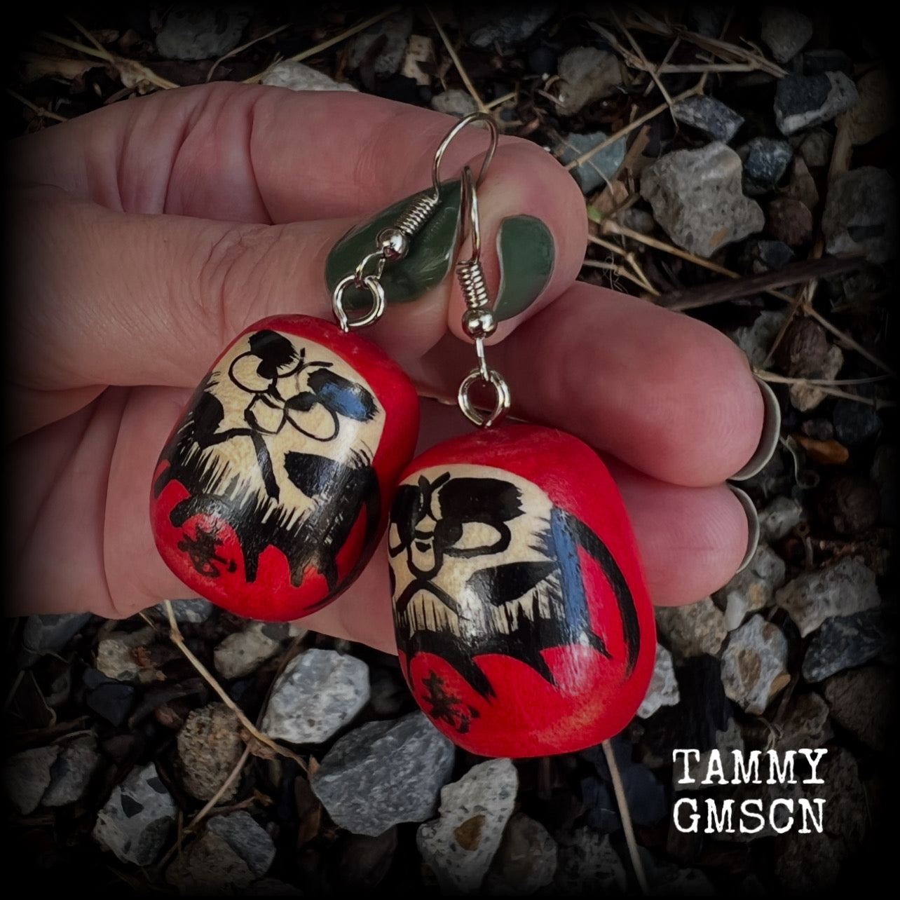 We found these amazing vintage wooden hand painted daurma dolls at our favourite temple markets, Sen do-ji!

Measuring just over 5cms from tip to tip and weighing only 5 grams each, these amazing wooden daruma earrings have been made with stainless steel french hooks, for pierced ears.