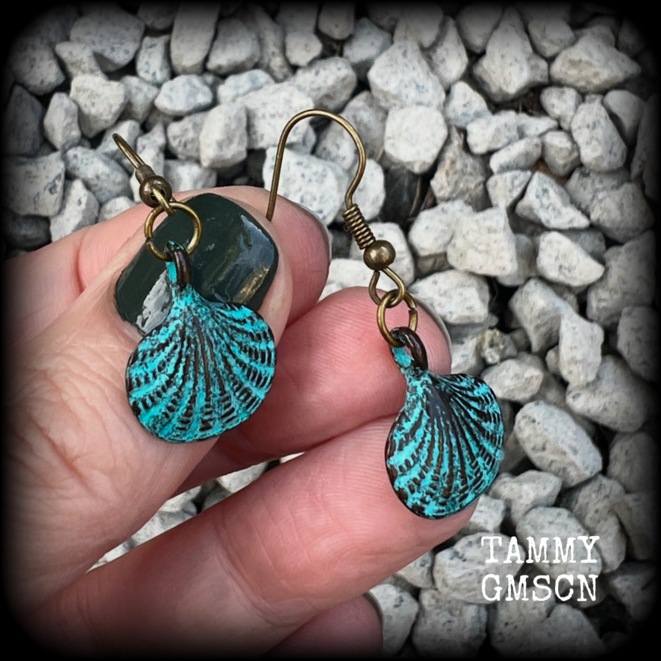 This is a simpler pair of earrings from our Sea Hag range, featuring a single gorgeous verdigris patina charm shell, measuring just under 4cms from tip to tip and weighing only a few grams each.

This pair has been made with antique bronze french hooks, for pierced ears.