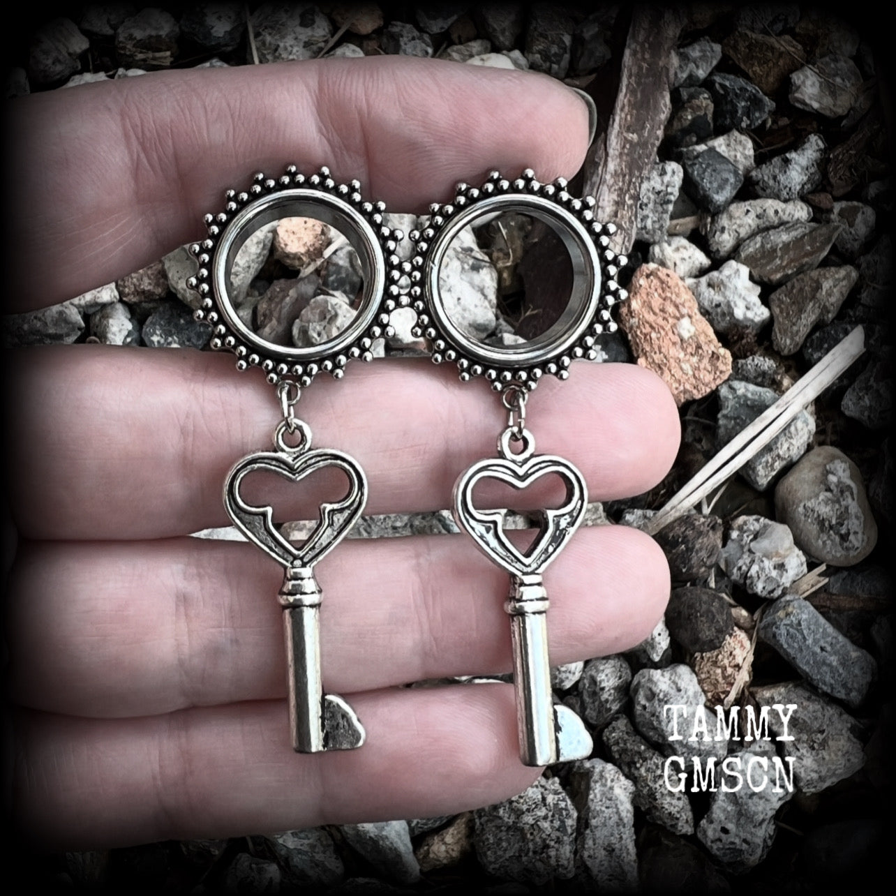 These gothic cathedral inspired tunnel earrings feature gorgeous antique silver keys, weighing approx 9 grams each, and measuring just under 6cms from tip to tip.

This pair have been made on 5/8” gauge (16mm) ornate surgical steel tunnels, suitable for stretched lobes.